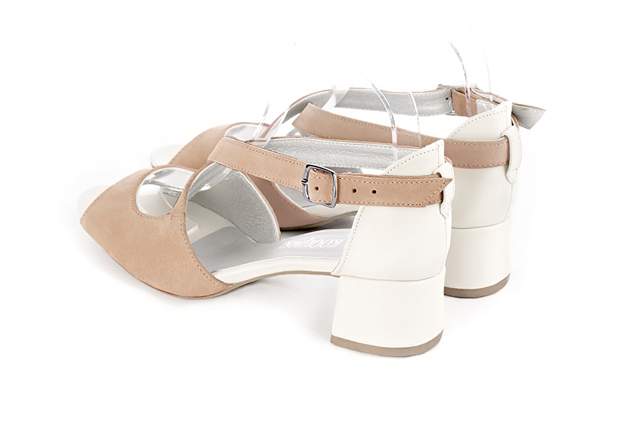 Women's biscuit beige and off white elegant sandals closed at the back with crossed straps. Round toe. Low flare heels - Rear view